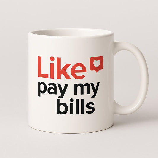 Λευκή κεραμική κούπα με την αστεία φράση "Like… pay my bills" και εικονίδιο καρδιάς, ιδανική για influencers και content creators. - The Gift Box thegiftbox.gr